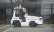 A driverless cargo tractor is put into use at Xiaoshan International Airport in Hangzhou,...