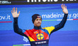 Jonathan Milan of Italy and Team Lidl - Trek celebrates on the podium as the Purple Sprint...