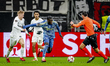 Eintracht Frankfurt midfielder Hugo Larsson and AFC Ajax Amsterdam defender Jorthy Mokio p...