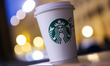  Starbucks paper cup is seen on a street in Florence, Italy on March 12th, 2025 