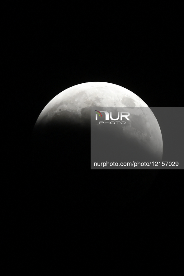 A general view of the total lunar eclipse shows the moon tinged with a reddish hue for a little more than an hour, known as a blood moon. Th...