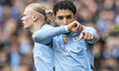 Omar Marmoush #7 of Manchester City F.C. celebrates his goal during the Premier League mat...