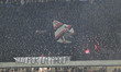 AC Milan supporters attend the Italian Serie A football match between AC Milan and Calcio...