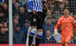 Callum Paterson of Sheffield Wednesday and Jack Robinson of Sheffield United jump for the...