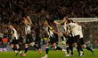 Harvey Barnes of Newcastle United (second from right) leads the celebrations after the Car...
