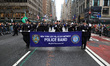 The NYPD Marching Band performs while marching during the St. Patrick's Day Parade in New...