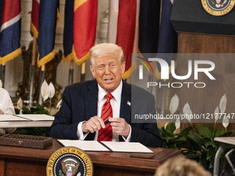 President Donald Trump signs an executive order that calls for eliminating the Department of Education in Washington, DC, on March 20, 2025.... by Andrew Thomas/NurPhoto