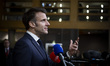 President of France Emmanuel Macron does a doorstep press briefing after the end of the Eu...