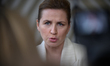 Denmark's Prime Minister Mette Frederiksen talks to the media as she arrives at the Europe...
