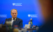 Polish Prime Minister Donald Tusk looks on during a meeting with the entrepreneurs' social...