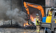 Firefighters work to extinguish flames at a recycling center in Gogok-ri, Ima-myeon, Andon...
