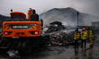Firefighters work to extinguish flames at a recycling center in Gogok-ri, Ima-myeon, Andon...