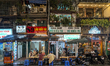 People walk and gather at bars and restaurants in the Amusement District of the Old Quarte...