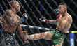 Ronaldo Rodriguez of Mexico kicks Kevin Borjas of Peru in a flyweight fight during the UFC...