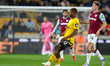 Number 12, Emmanuel Agbadou of Wolverhampton Wanderers, is in action during the Premier Le...
