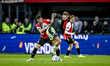 Feyenoord Rotterdam forward Jakub Moder and FC Groningen midfielder Luciano Valente play d...
