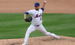 New York Mets relief pitcher A.J. Minter #33 throws during the seventh inning of the baseb...