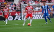 Oriol Romeu of Girona FC is in action during the LaLIGA 2024-2025 match between Girona FC...