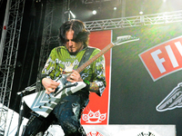 Jason Hook with Five Finger Death Punch performs during River City Rockfest at the AT&T Center on May 24, 2014 in San Antonio, Texas. (