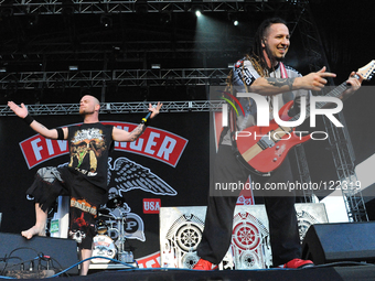 Ivan Moody (L) Zoltan Bathory with Five Finger Death Punch perform during River City Rockfest at the AT&T Center on May 24, 2014 in San Anto...