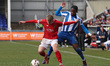 Reyes Cleary of Hartlepool United battles for possession with Ryan Carr of Ebbsfleet Unite...