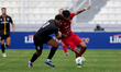 Edward Orlando Bolanos Angulo of Naxxar Lions plays against Zachary Grech of Zabbar St. Pa...