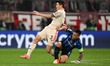 Min-Jae Kim of FC Bayern Monaco and Lautaro Martinez of FC Inter are in action during the...