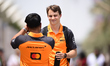 Oscar Piastri of the McLaren F1 Team arrives in the paddock during free practice of the Ba...