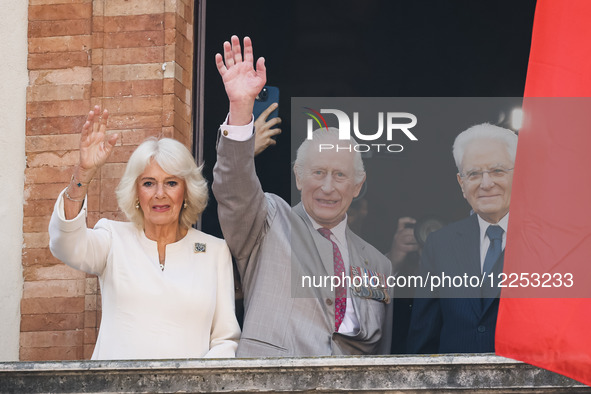 Britain's King Charles III, Queen Camilla, and Italian President Sergio Mattarella arrive at Piazza Del Popolo during the state visit to the...