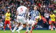 Isaac Price of WBA is in defensive action during the Sky Bet Championship match between We...
