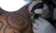 Tattoo artists and enthusiasts get tattooed during the ''Nepal Tattoo Convention'' organiz...