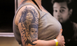 Tattoo artists and enthusiasts get tattooed during the ''Nepal Tattoo Convention'' organiz...
