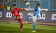 Al-Ahly player Wessam Abo-Ali is in action with a Pyramids player during a match between A...