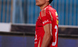 Al-Ahly player Ashraf Ben Sharqi participates in a match between Al Ahly and Pyramids in t...