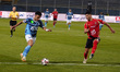 Al-Ahly player Ashraf Dary is in action with Pyramids player Mostafa Fathy during a match...