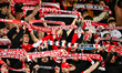 Fans of Dinamo attend the Universitatea Cluj vs. Dinamo match in the Playoff of the Romani...