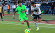 Robert Ergas #22 of Pumas and Denzell Garcia #5 of Juarez fight for the ball during the ma...