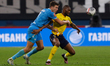 Aleksandr Sobolev (L) of Zenit and Oumar Sako of Rostov vie for the ball during the Russia...