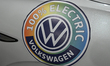 EDMONTON, CANADA - APRIL 13: A '100% Electric' sticker displayed on a new 2025 Volkswagen...