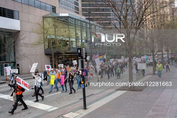 Demonstrators participate in the nationwide 'Hands-Off!' 50501 Day of Protest to protest against Project 2025, the policies of President Don...