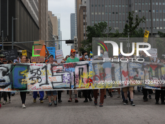 Demonstrators attend a rally at City Hall in Houston, Texas, on April 19, 2025, as part of a nationwide ''50501'' rally, which sees over 600... by Reginald Mathalone/NurPhoto