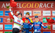 Tadej Pogacar (2nd), Mattias Skjelmose (1st), and Remco Evenepoel (3rd) participate in the...