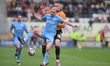 Jordan Brown (8 Leyton Orient) is challenged by Ryan Loft (18 Cambridge United) during the...