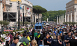 Visitors are seen near the Vatican, following the Pope's death, in Rome on April 23, 2025....