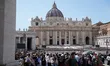 Visitors are seen near the Vatican, following the Pope's death, in Rome on April 23, 2025....