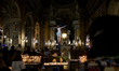 A portrait of a faithful during the homage to the body of Pope Francis in St. Peter's Basi...