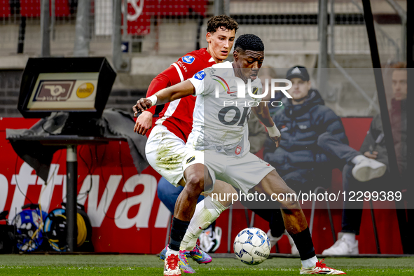 AZ Alkmaar forward Ruben van Bommel and NAC Breda defender Cherrion Valerius play during the match between AZ and NAC at the Afas Stadium fo... by EYE4images/NurPhoto