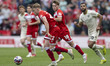 Tommy Conway drives forward during the Sky Bet Championship match between Middlesbrough an...