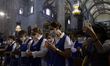 Dozens of people attend a solemn Eucharist at the Metropolitan Cathedral of Mexico City, M...