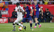 Ferran Torres of FC Barcelona competes for the ball with Antonio Rudiger of Real Madrid du...
